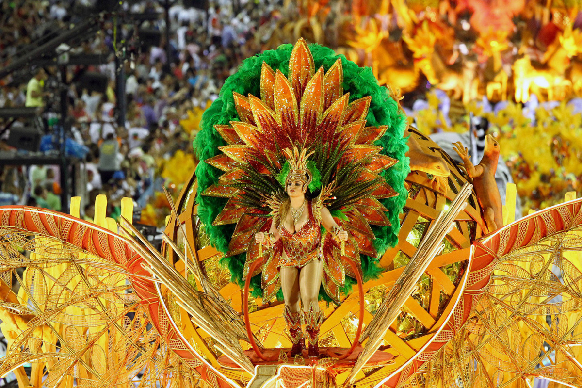 73595, RIO DE JANEIRO, BRAZIL - Sunday February 19, 2012. Images from Brazil's Carnival in Rio de Janeiro where huge crowds came out to watch and dance to glitter and feather wearing, bikini clad women atop lavish ornate floats. **NORTH AMERICAN USE ONLY** Photograph: © VPA, PacificCoastNews.com