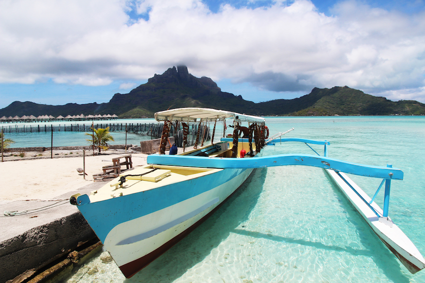 A boat with Bora Bora in the background